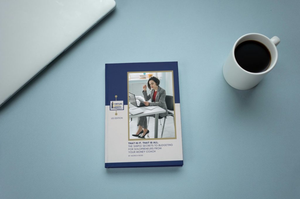 solopreneur money coach budgeting workbook on desk US